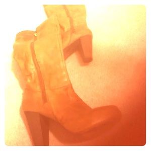 Heeled brown leather boots size 7.5